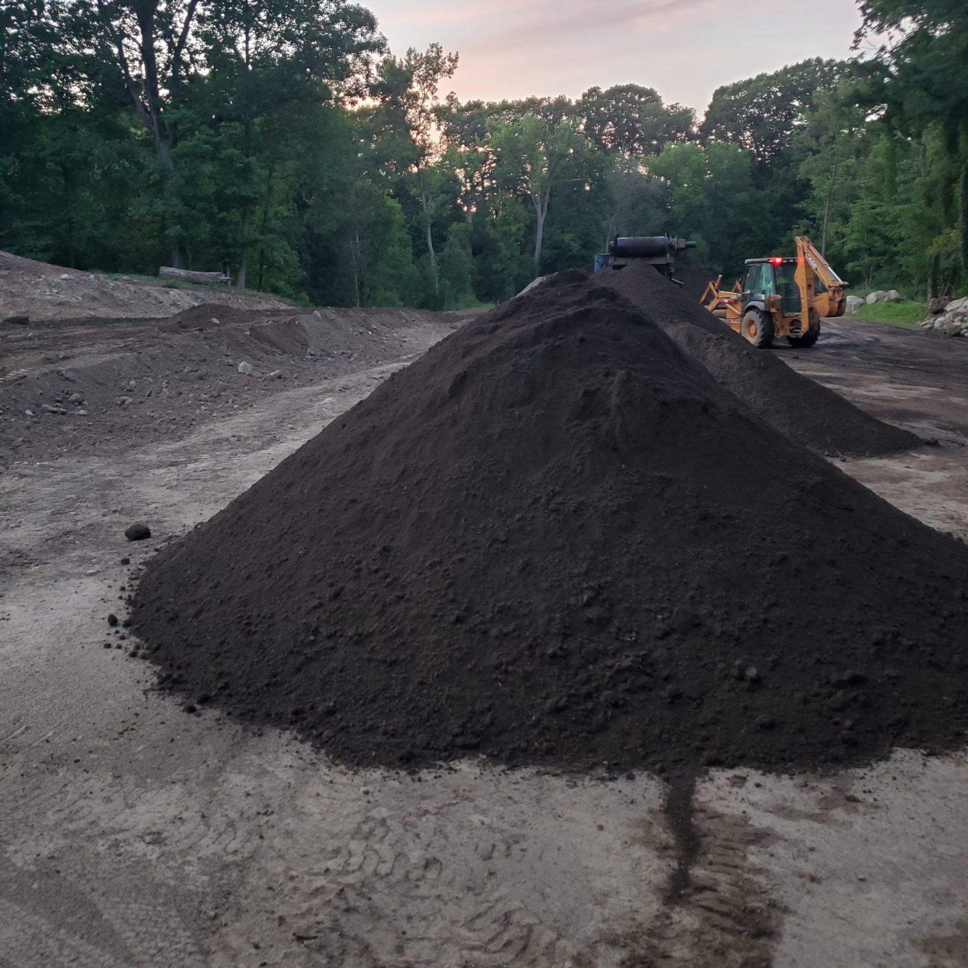 Bloom Contractors Topsoil Pile Rochester NY